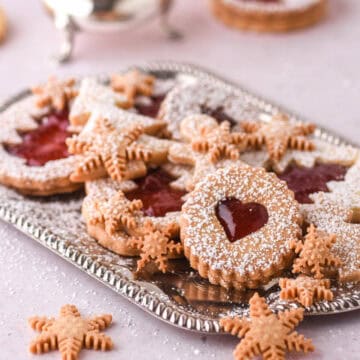 Christmas cookies shown on a silver tray