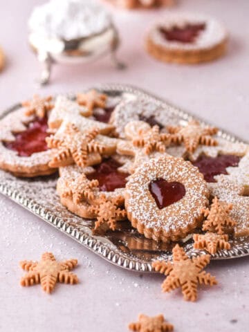 Christmas cookies shown on a silver tray