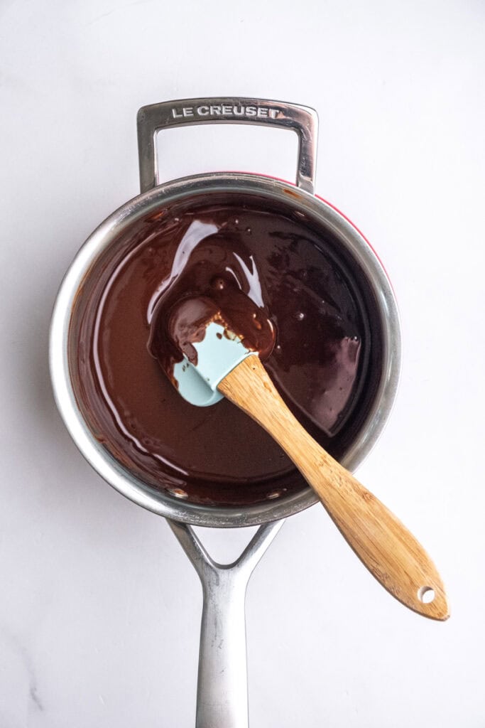 Image showing step 1, the melted butter and chocolate in a saucepan. 